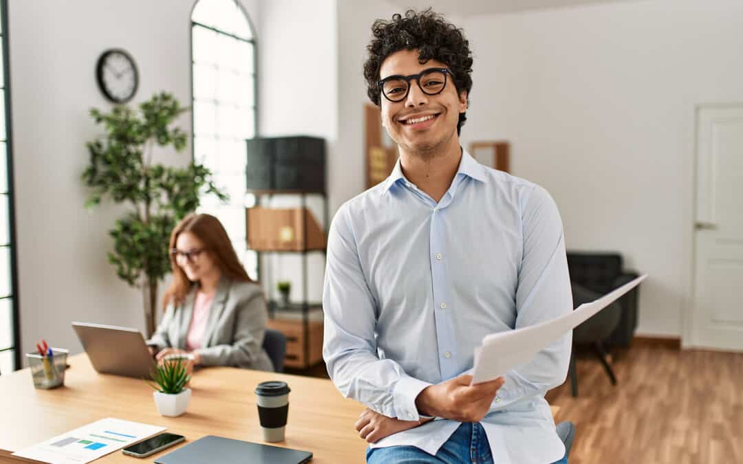 Business manager smiling happy and confident. Employee working a